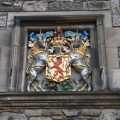 Crest on the wall of one of the castle buildings